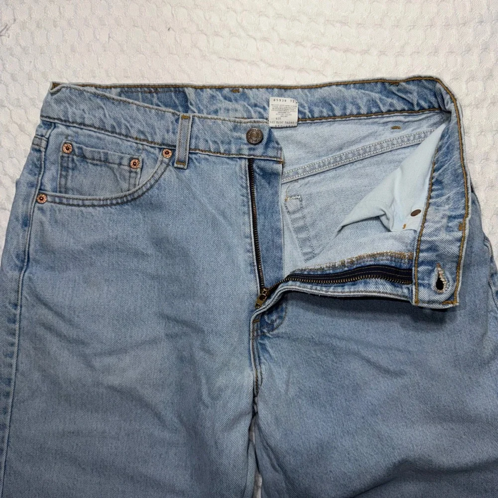 VTG 90s Levis 550 Relaxed Fit Distressed Jeans Mens 34x36 Light Wash Made in USA